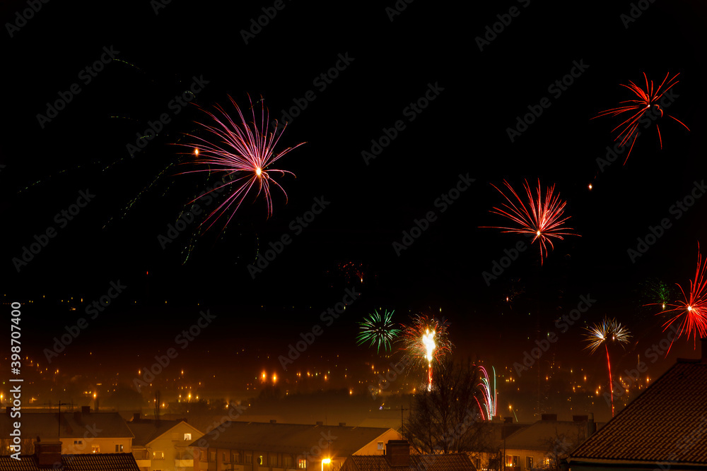 City with fireworks at the dark sky City with fireworks at the dark sky