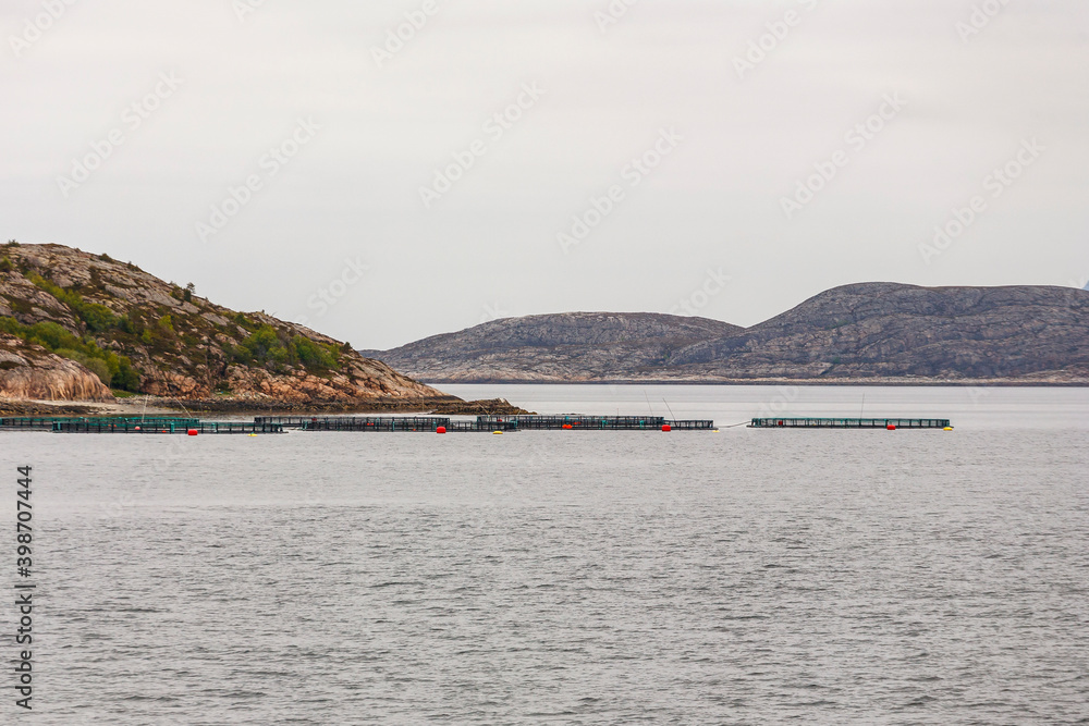 Fish farming cages at the norwegian coast