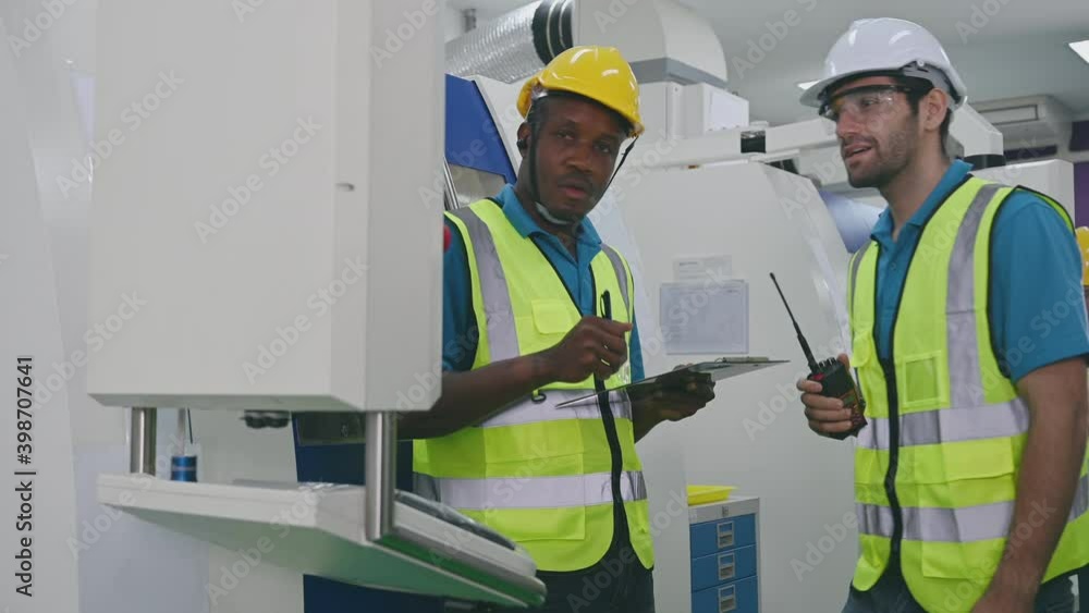 multi ethnicity engineer and workers working in line up multi ethnicity engineer and workers working in line up