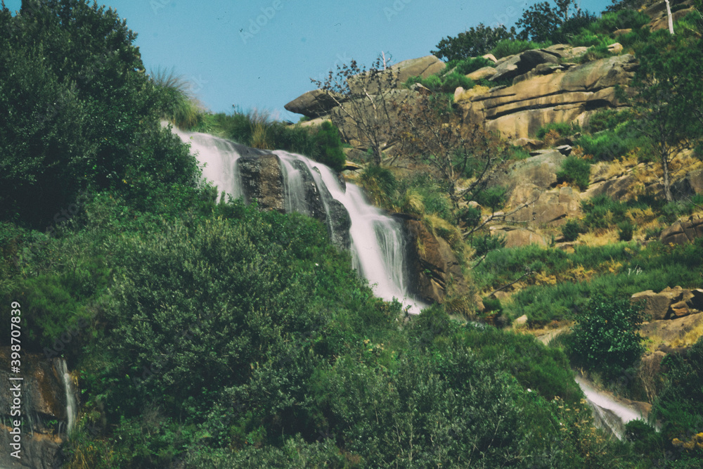 Green landscape with waterfall in Galicia