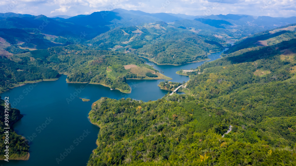 landscape aerial view mae suai dam andthe route with bridges connecting the city in valley
