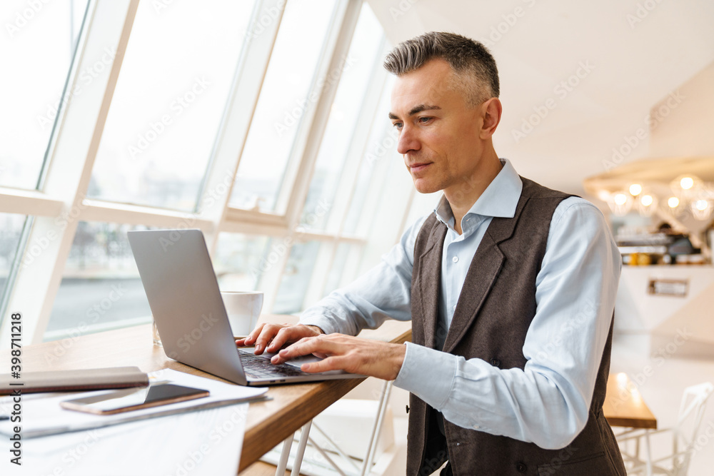 Confident handsome businessman in smart clothes Confident handsome businessman in smart clothes