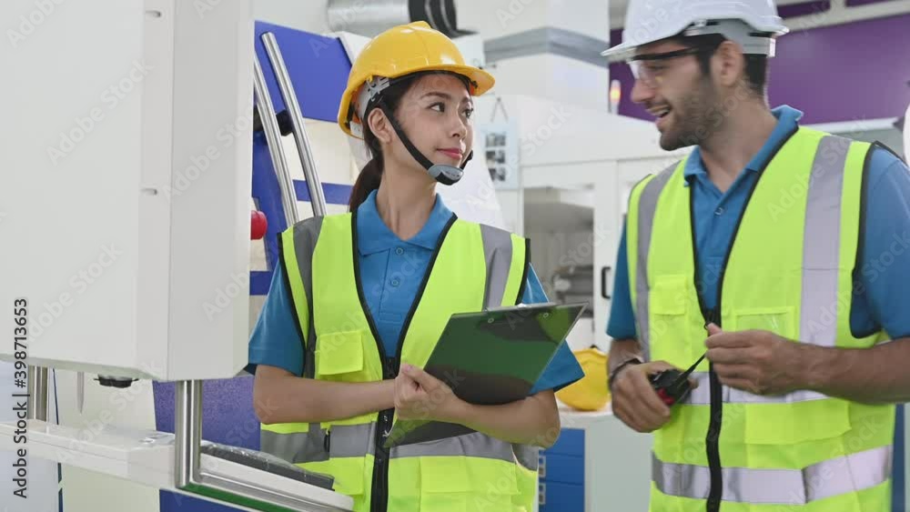 multi ethnicity engineer and workers working in line up multi ethnicity engineer and workers working in line up