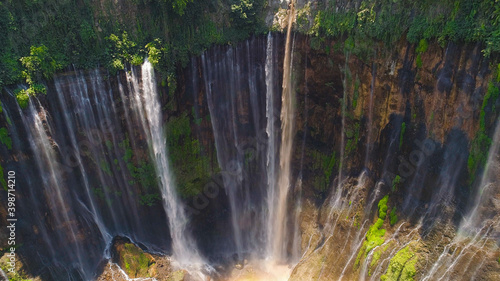 aerial view waterfall coban sewu in Java  indonesia. waterfall in tropical forest by drone Tumpak Sewu