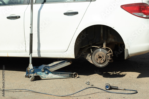Car repair in a tire company. Changing wheels and tires, the car business