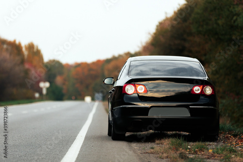 black car on asphalt road © Ruslan Ivantsov