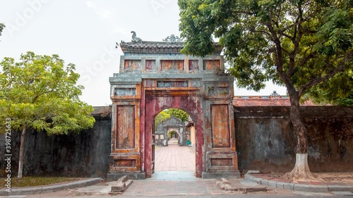 Wallpaper Mural Hue Imperial City, Vietnam - time lapse of Walled stone fortress entrance. Summer cloudy day Torontodigital.ca