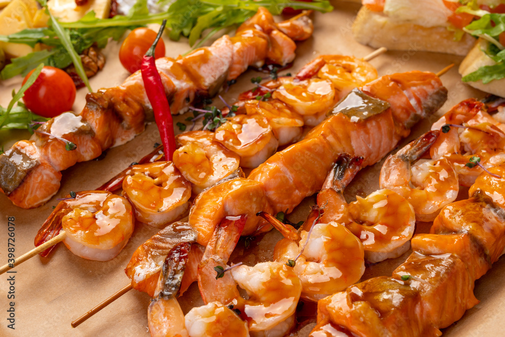 fish skewers on in sauce. Yakitori in teriyaki sauce. Seafood on skewers fish skewers on in sauce. Yakitori in teriyaki sauce. Seafood on skewers