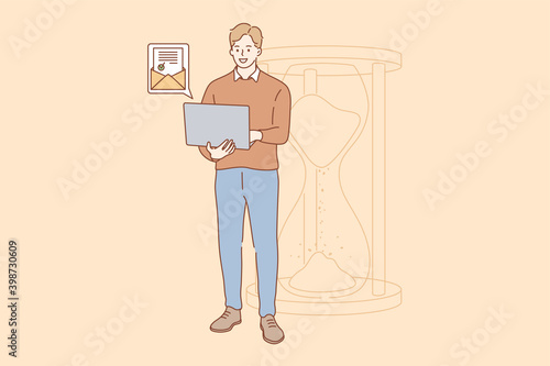Efficiency in work, successful task completion, excellent time management. Happy young businessman standing with laptop near big sandglass and getting good news by email vector illustration