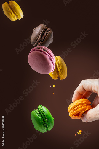 Close up vertical image of Floating macarrons  photo