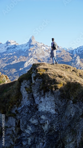 hiker on top of mountain © Daphne
