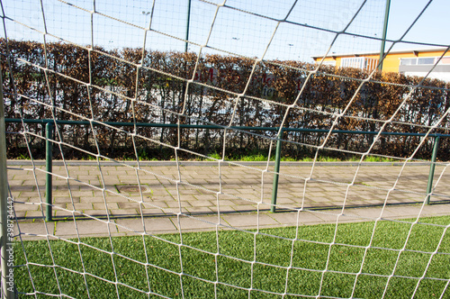 Wallpaper Mural Closeup of a soccer goal net on a field of green artificial grass  Torontodigital.ca