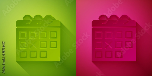 Paper cut Calendar fitness icon isolated on green and pink background. Training schedule. Paper art style. Vector.