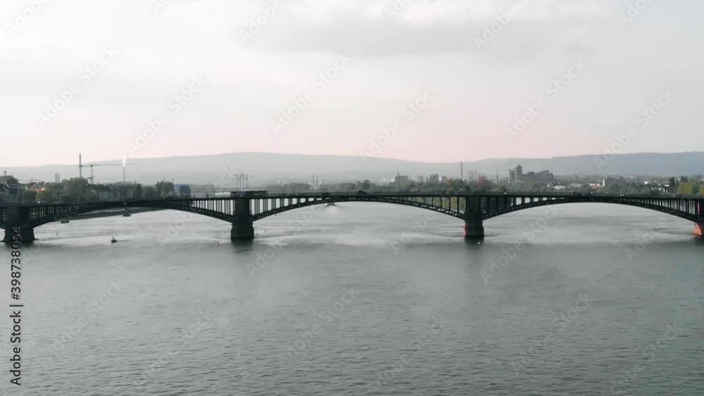 Aerial drone view towards traffic on a bridge, in Mainz city, Germany Aerial drone view towards traffic on a bridge, in Mainz city, Germany