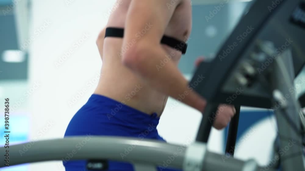 Triathlete runner man workout testing vo2 max in modern sport science lab Triathlete runner man workout testing vo2 max in modern sport science lab