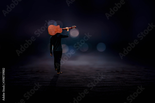 person with guitar