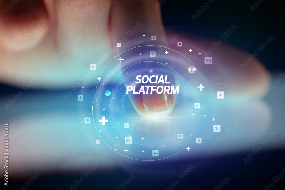 Finger touching tablet with social media icons and SOCIAL PLATFORM Finger touching tablet with social media icons and SOCIAL PLATFORM