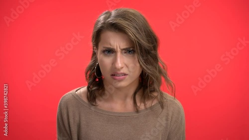 Women smiles then becomes disgusted  the angry expression change