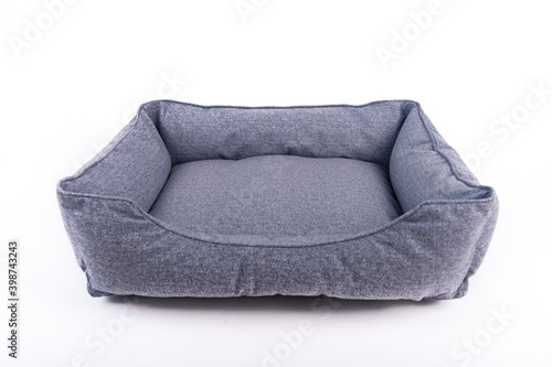Yellow soft small dog or cats bed. Angle view.