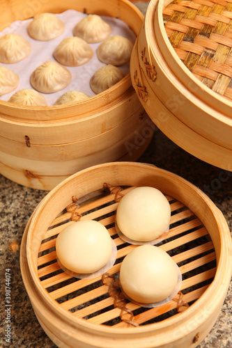 Chinese Steamed Buns and dumplings in a bamboo steamer