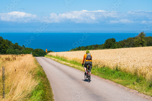 Cyclist on country road photo