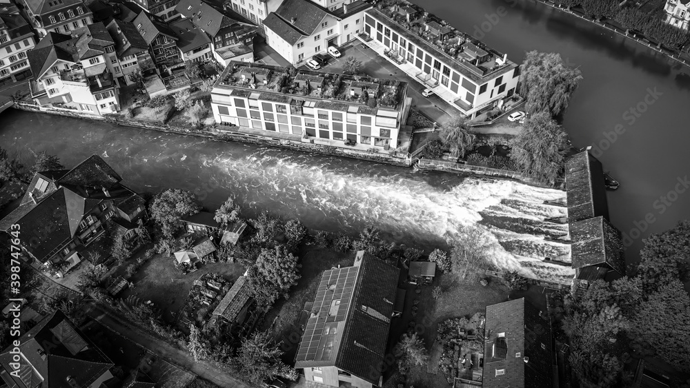 Aerial view over the city of Interlaken in Switzerland - amazing drone footage