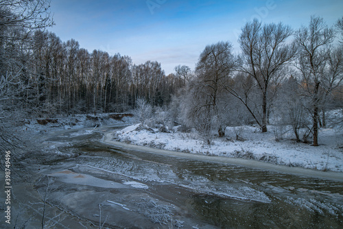 Frosty morning on a frozen river in the clouds of the Moscow region