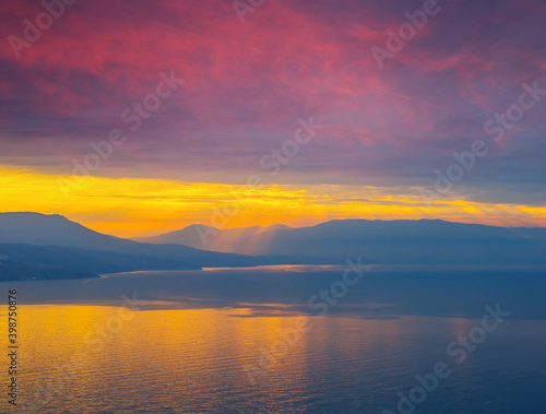 quiet sea bay at the dramatic sunset, outdoor natural background