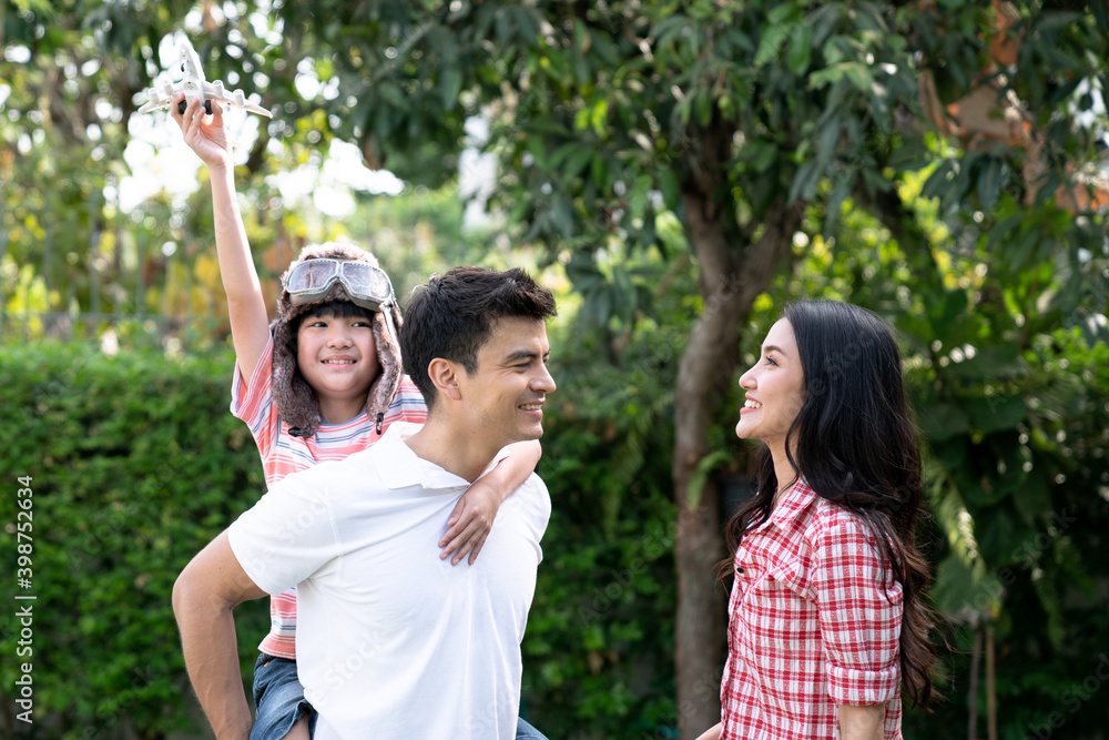 Happy Family, Father and mother playing with children outside. Happy Family, Father and mother playing with children outside.