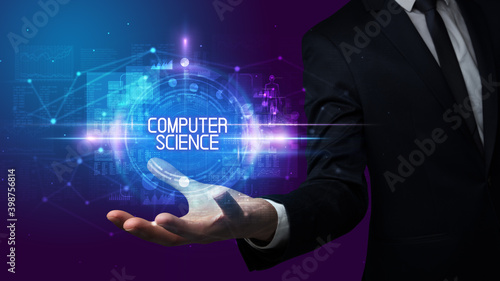 Man hand holding COMPUTER SCIENCE inscription, technology concept