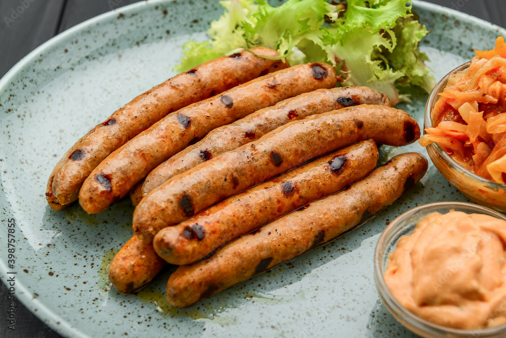 Bavarian fried sausages on sauerkraut