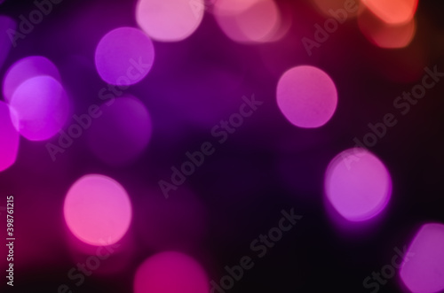Abstract pattern of blue bokeh lights on black background