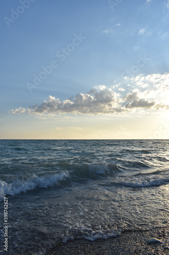 waves on the sea and yellow sky © loginov_photo_