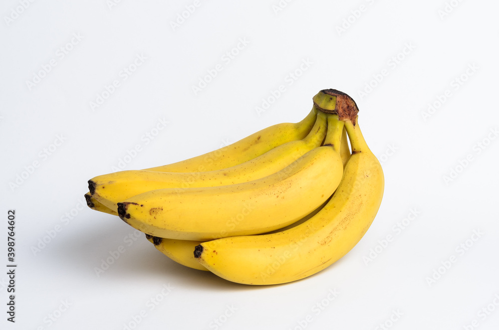 Bunch of ripe bananas on white background