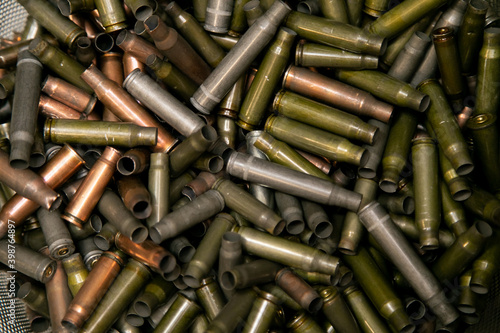 background of shell casings from firearms, shooting range for shooting firearms,