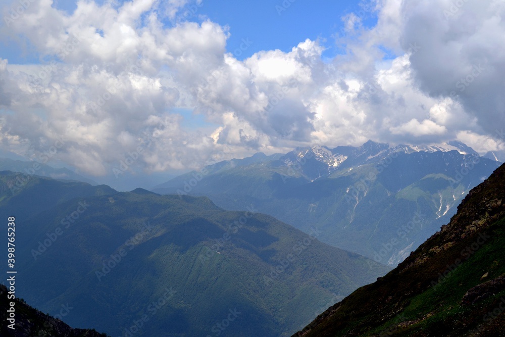 Naklejka premium mountains and clouds