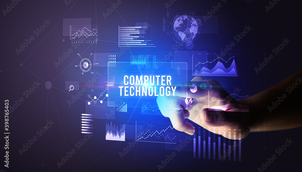 Hand touching COMPUTER TECHNOLOGY inscription, new business technology concept Hand touching COMPUTER TECHNOLOGY inscription, new business technology concept
