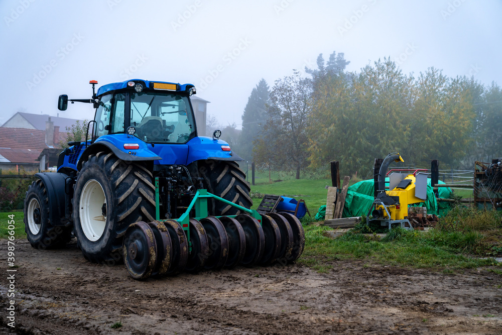 Fototapeta premium tractor on a farm in the countryside