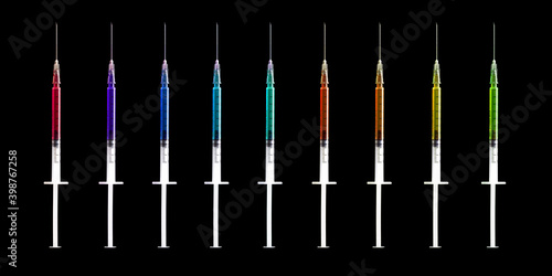 Syringes with colored liquid isolated on black. Injection needle. Vaccination, medicine and drug concept.