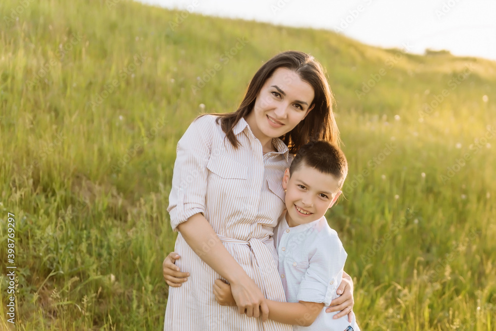 portrait of a young mother and son, happy motherhood portrait of a young mother and son, happy motherhood