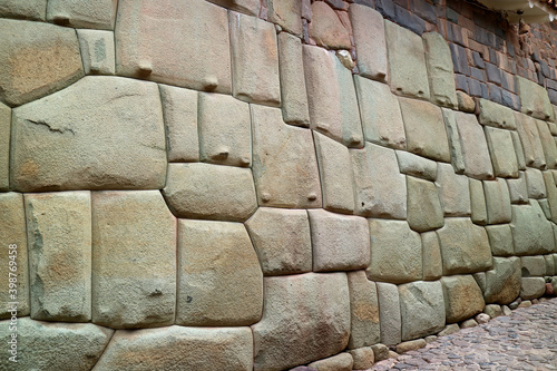 Amazing Stonework of the Inca Wall on Hatun Rumiyoc Street, the Ancient Street in Historic Centre of Cusco, Peru, South America