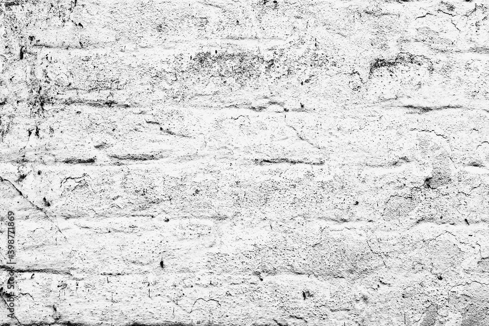Obraz premium Texture of a brick wall with cracks and scratches which can be used as a background