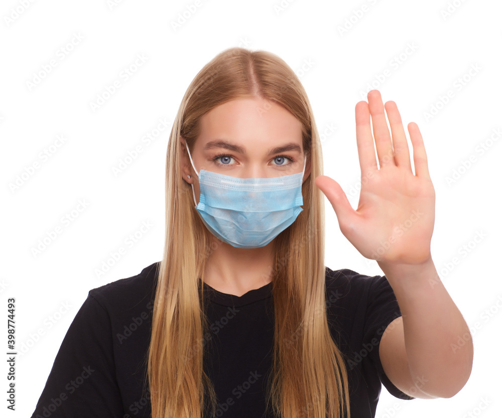 Girl wearing mask for protection from disease and show stop hands gesture for stop corona virus outbreak. Girl wearing mask for protection from disease and show stop hands gesture for stop corona virus outbreak.