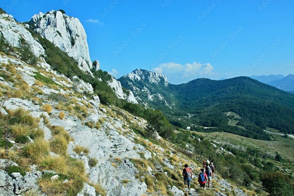 Croatia-view of the tourists under the top of  Kiza in the Velebit National Park
