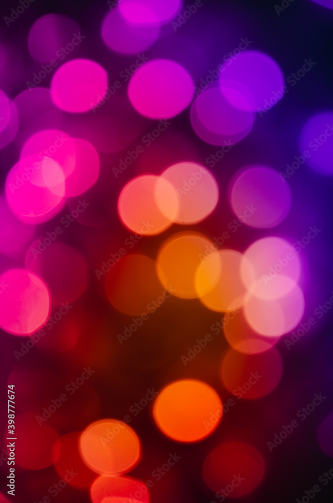 Abstract pattern of pink bokeh lights on dark background Abstract pattern of pink bokeh lights on dark background
