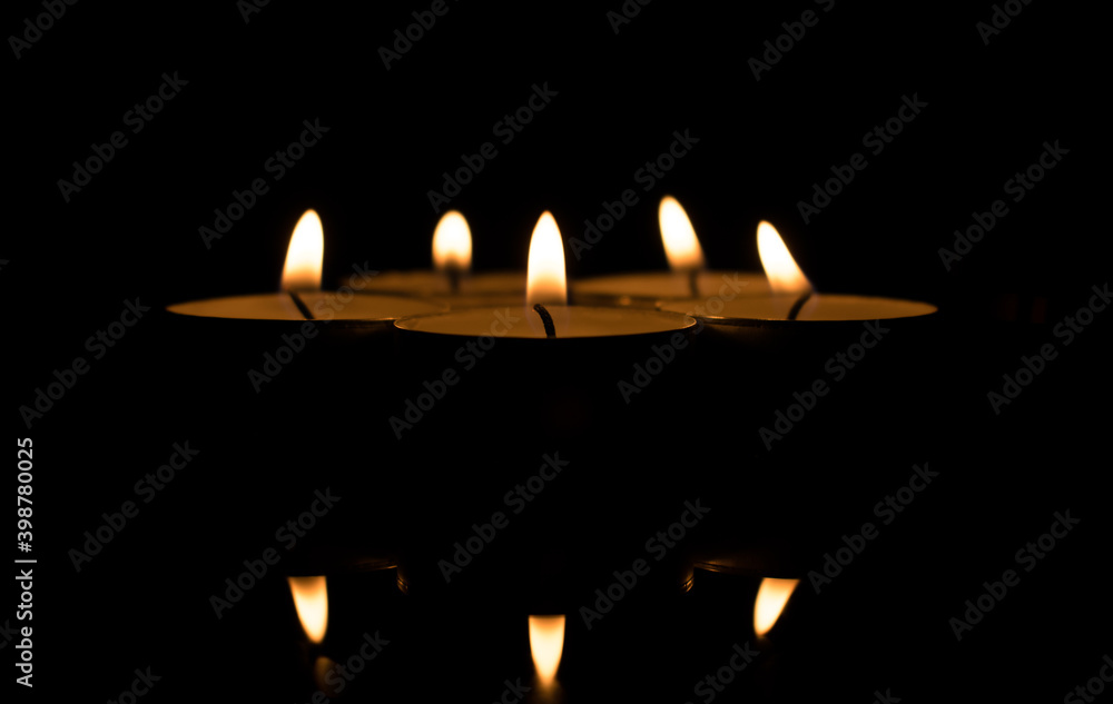 Group of candles. Candles lit to commemorate.