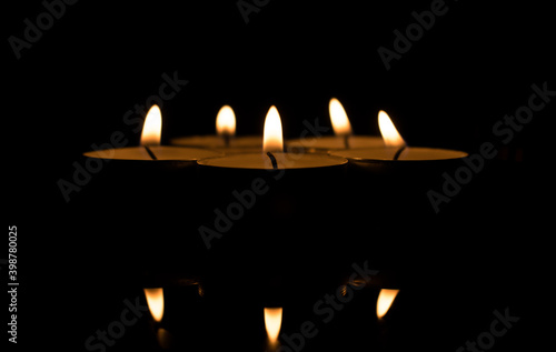 Group of candles. Candles lit to commemorate.
