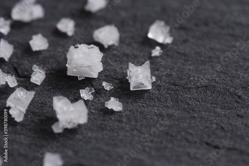 Tableau sur toile Crystals of flower of salt from Guerande France on a slate background