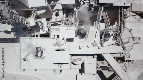 Mining and processing plant, mineral piles and sand Industrial building.