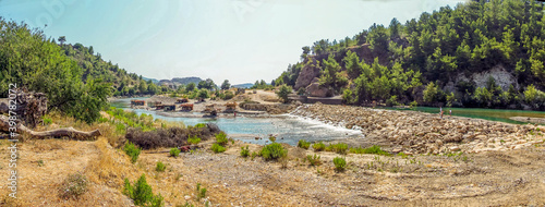 A panorama view across the Alahara river in the Alaharan valley in Turkey in the summertime